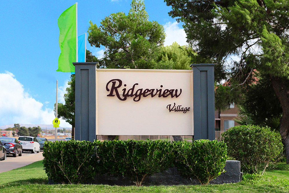 This image displays entrance marker photo of Ridgeview Village Apartments